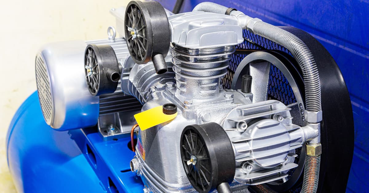 What is a reciprocating air compressor?