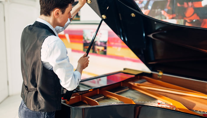 Grand piano with coating