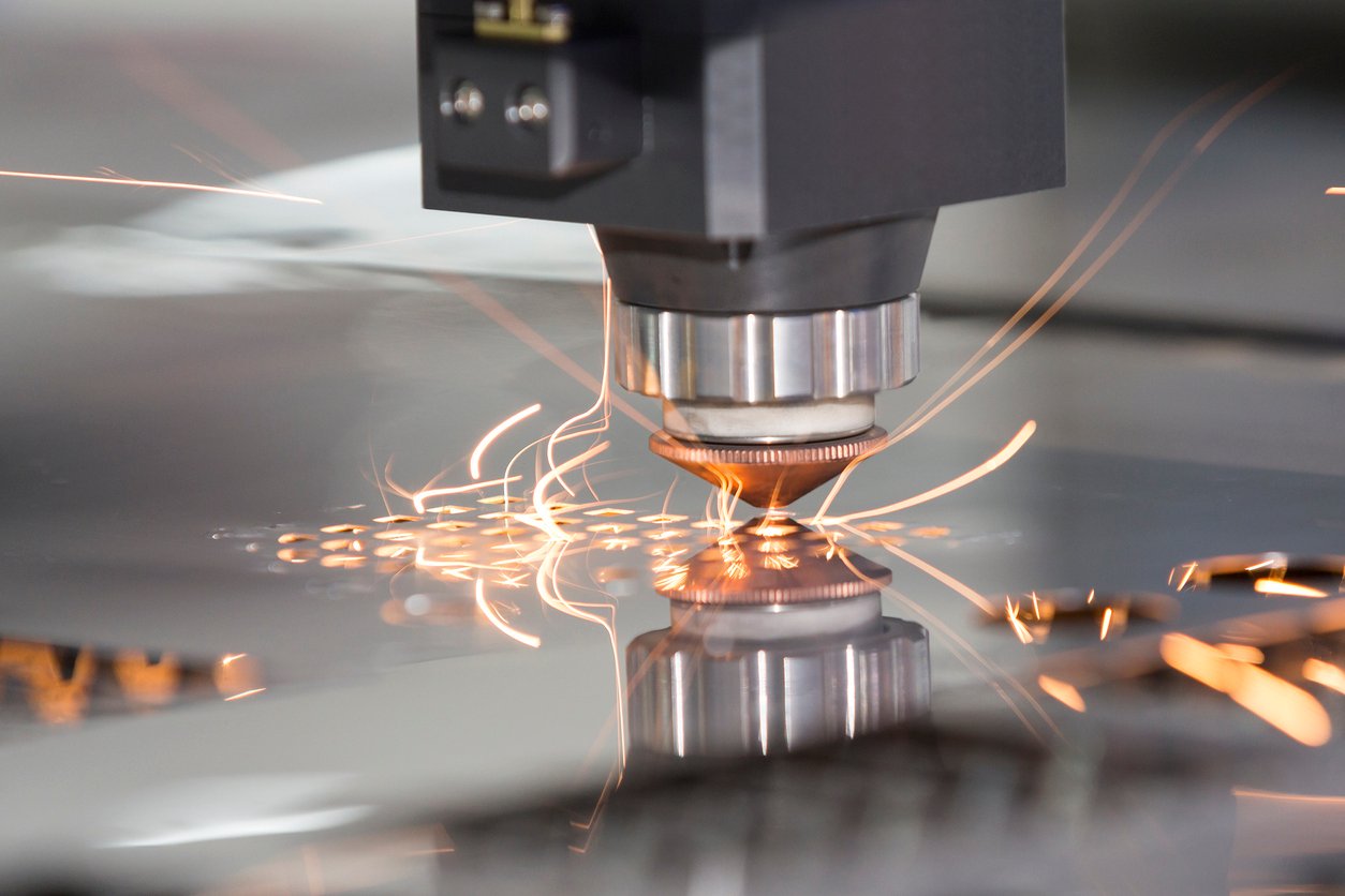 Compressed air and nitrogen laser cutting systems